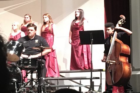 Custine performs on bass for the Chamber Singers during "Wayfaring Stranger".