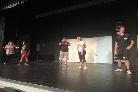 Junior Erin Adams, senior Mason Wellbrock, junior Sara Rohleder and sophomore Zac Wyse prepare to perform the dance routine for "Bye Bye Birdie" auditions.