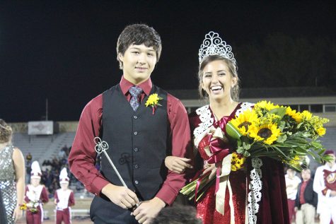 Callis and senior Marie Reveles at the Homecoming crowning ceremony.