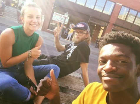 Norris, Purdue and Phlieger take a break before playing downtown for a Fort Hays event. 