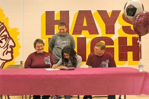 Senior Lieacha Cook signs to Bethel College