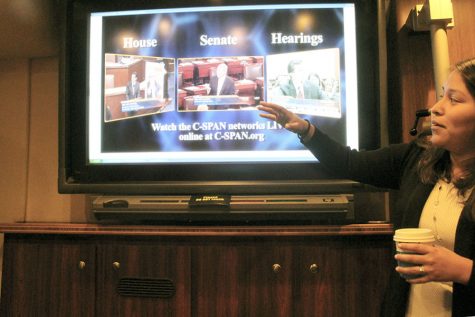 C-SPAN reporter, Torres, gives a presentation to the select group of students and teachers.