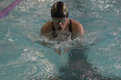 Swim team places fourth in Manhattan April 16